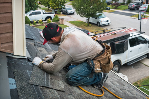 Professional Roof Replacement technician working in Lewisville, PA
